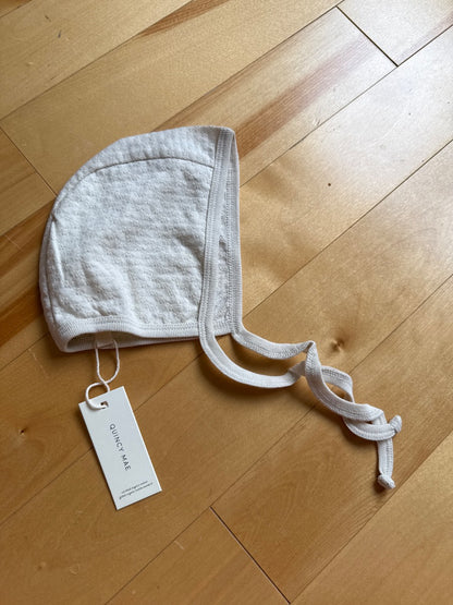 Quincy Mae Bonnet, Tuque